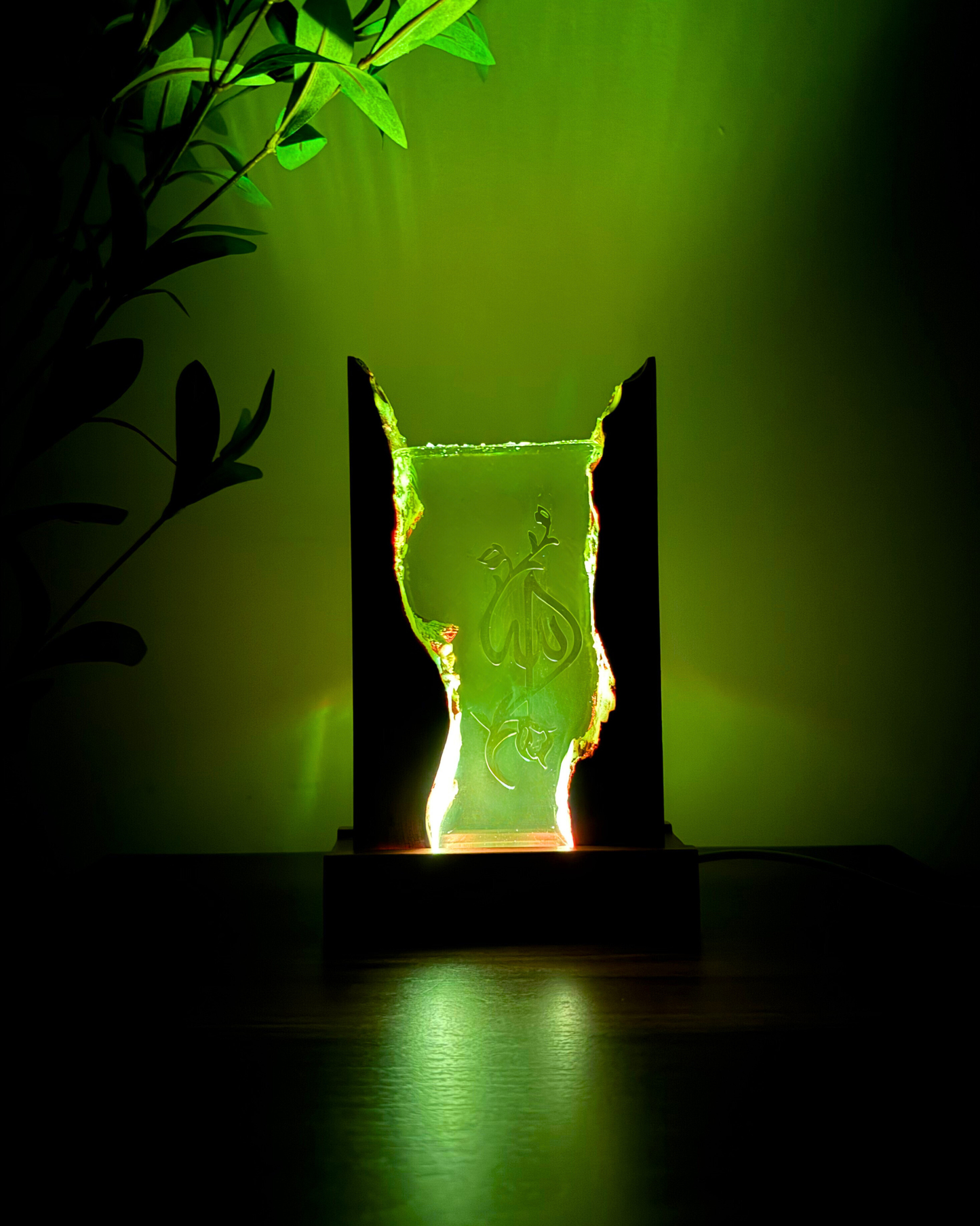 Premium Islamic resin décor with LED base, lit in a dark setting for a warm, elegant look